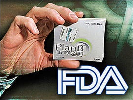 Pharmacist holds package of "Plan B" emergency contraceptive tablets