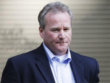 Michael D. Barrett departs the Metropolitan Correctional Center in Chicago Oct. 5, 2009.