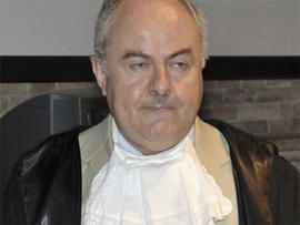 Prosecutor Giuliano Mignini gestures during a hearing in the Meredith Kercher murder trial, in Perugia, Italy, Friday, June 12, 2009.