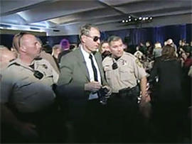 Arizona Shooting Victim Remains Under Psychiatric Evaluation Following Town Hall Outburst