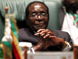 Robert Mugabe, President of the Republic of Zimbabwe, attends a joint Arab-African summit in the Libyan coastal city of Sirte on October 10, 2010. AFP PHOTO/KHALED DESOUKI (Photo credit should read KHALED DESOUKI/AFP/Getty Images)