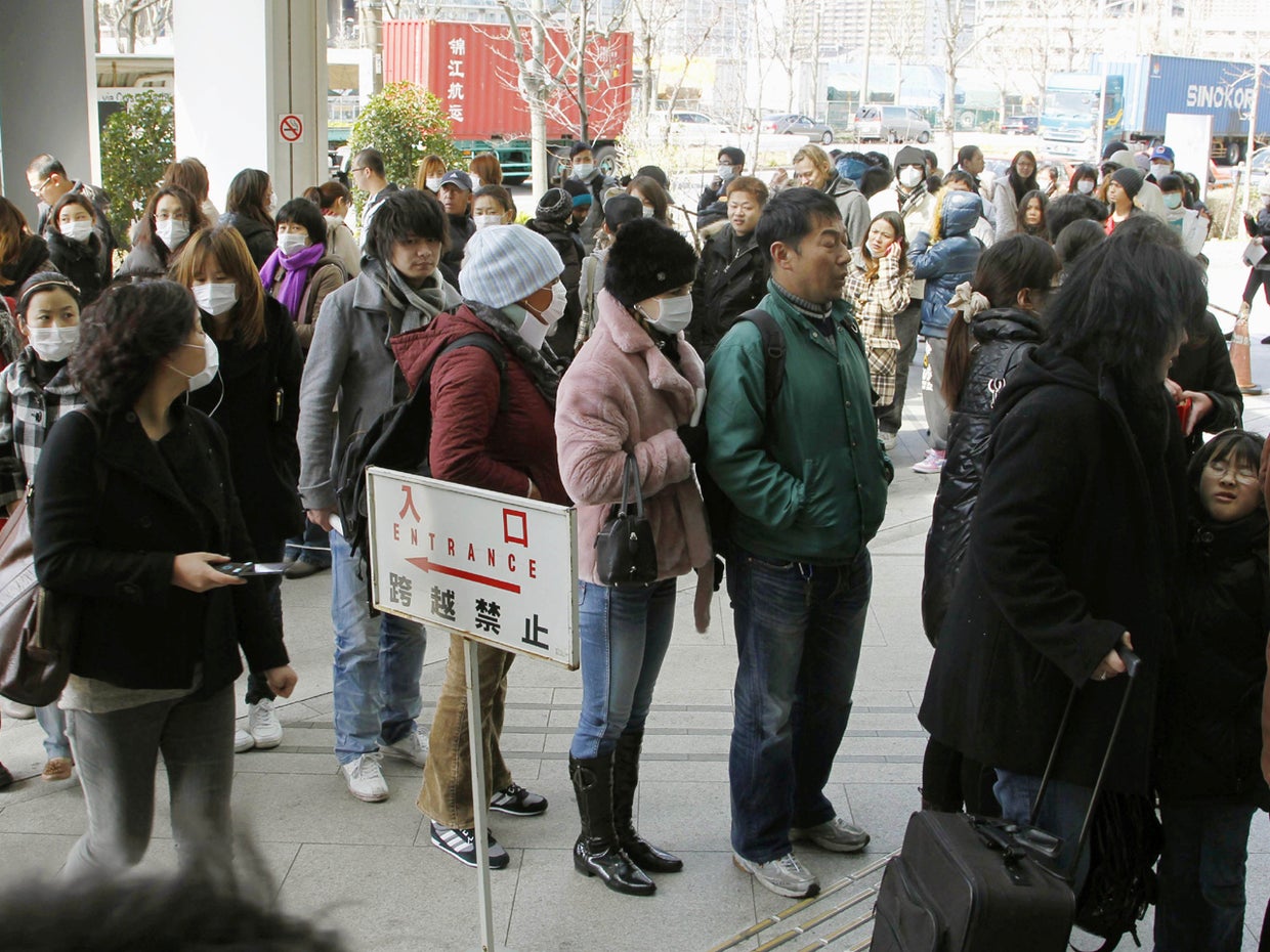As foreigners flee, Japanese lament lack of info CBS News
