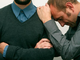 gay couple, two men, grieving, sad, homosexual men, homosexual couple, brothers, sad, stock, 4x3