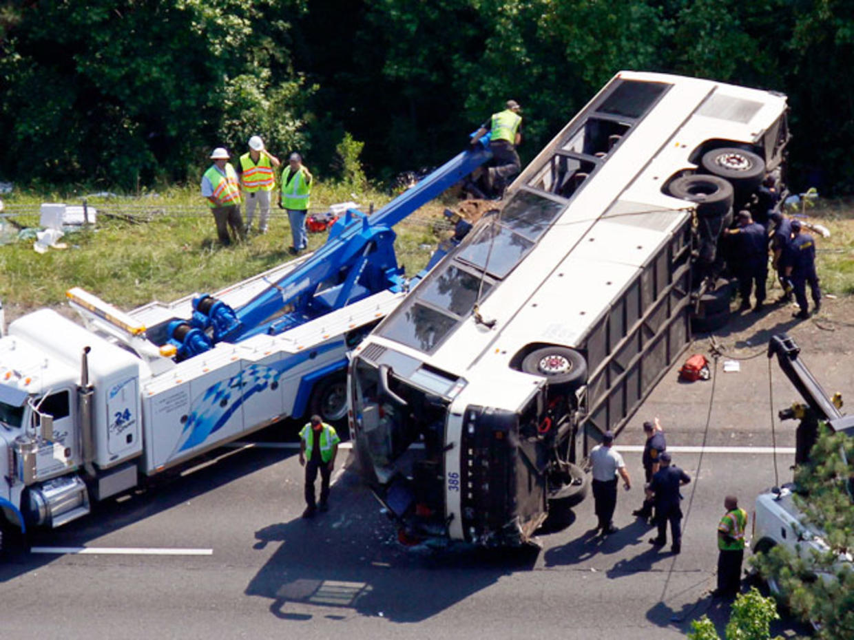 Driver charged in Va. bus crash that killed 4, hurt dozens - CBS News