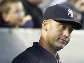 New York Yankees' Derek Jeter watches during the second inning of a baseball game against the Texas Rangers on June 14, 2011, at Yankee Stadium in New York.