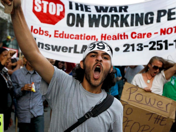 Anti-Wall Street demonstrators march in downtown Los Angeles Oct. 3, 2011.