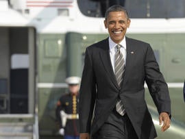 President Barack Obama walks from Marine One and heads toward Air Force One at Andrews Air Force Base in Md., Monday, Oct. 24, 2011. Obama is heading on a three-day trip to the West Coast.