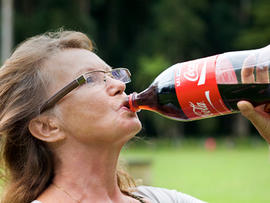 woman, senior, elderly, soda, sugary drink, drinking, coke, coca cola, stock, 4x3