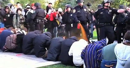 Officers in pepper spray incident put on leave CBS News