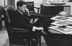 President John F. Kennedy is shown as he ends his official day after 7:30 pm with a final phone call 