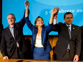 Mexican presidential candidate Josefina Vazquez Mota celebrates her victory with her counterparts Santiago Creel, left, and Ernesto Cordero from the National Action Party during a press conference in Mexico City Feb. 5, 2012.
