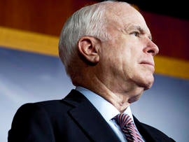 Sen. John McCain, R-Ariz., watches during a news conference on Capitol Hill Feb. 2, 2012, in Washington.