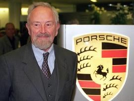 Picture taken on January 22, 1999 shows Ferdinand Alexander Porsche posing next to the logo of German sports car maker Porsche in Stuttgart, southern Germany. As the company announced on April 5, 2012, Ferdinand Alexander Porsche died at the age of 76. He was honorary chairman of the company's supervisory board and is known as designer of the company's iconic Porsche 911 car. AFP PHOTO / BERND WEISSBROD GERMANY OUT (Photo credit should read BERND WEISSBROD/AFP/Getty Images)
