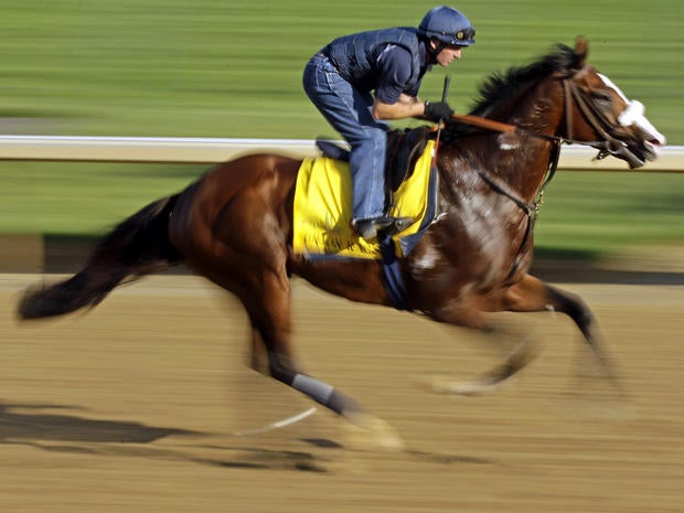 Exercise rider Peter Brette takes Kentucky Derby entrant Union Rags for a workout at Churchill Downs May 2, 2012, in Louisville, Ky.