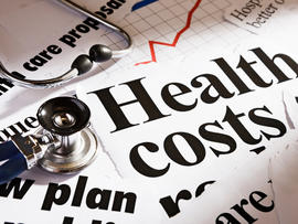 Health cost headlines, stethoscope and rising graph