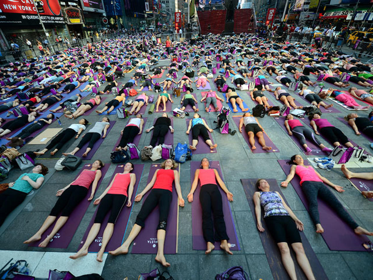 Yoga takes over Times Square for summer solstice Photo 1 Pictures