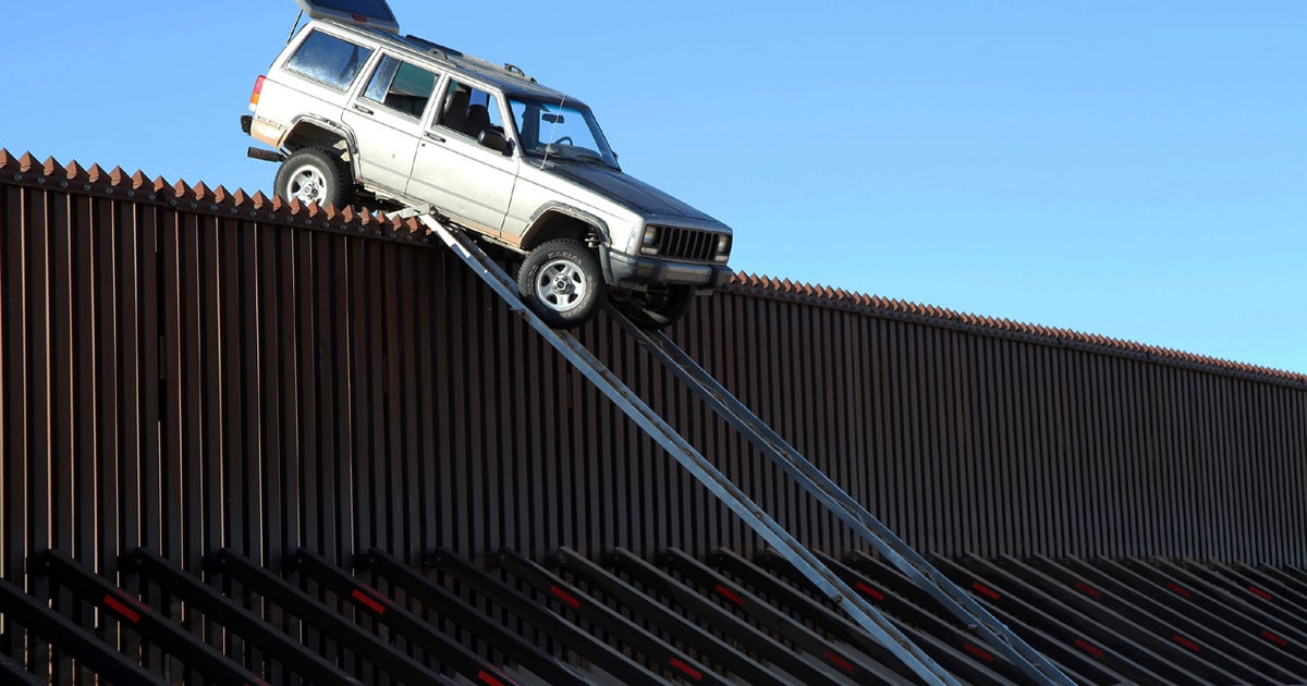 Suspected drug smugglers get stuck trying to drive over U.S.-Mexico border fence