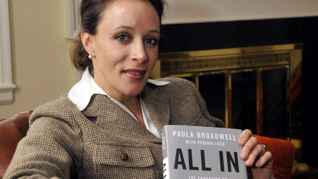 Paula Broadwell, author of the David Petraeus biography 'All In,' poses for photos in Charlotte, North Carolina 