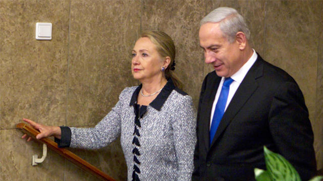 Israel's Prime Minister Benjamin Netanyahu walks with U.S. Secretary of State Hillary Rodham Clinton upon her arrival to their meeting in Jerusalem, Tuesday, Nov. 20, 2012. A diplomatic push to end Israel's nearly weeklong offensive in the Gaza Strip gain 