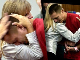 Renee Napier embraces Eric Smallridge.