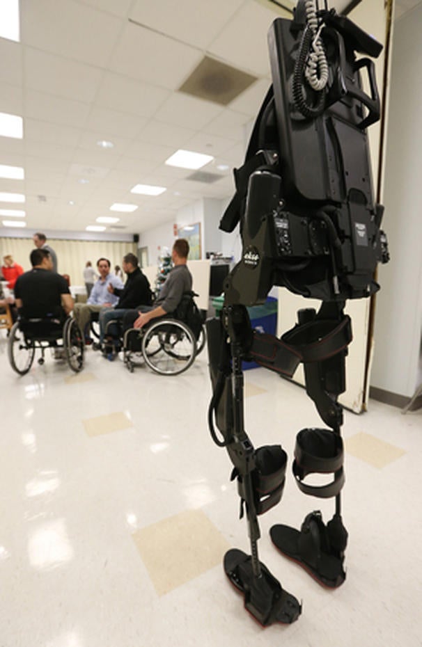 Robotic suit enables paraplegics to walk Photo 3 Pictures CBS News