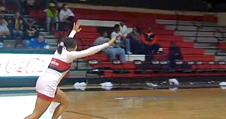 Cheerleader Makes Incredible Half Court Basketball Trick Shot