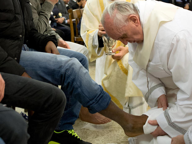 Pope Francis washes the foot of an inmate at the juvenile detention center of Casal del Marmo, Rome, on March 28, 2013. 