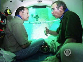 Dr. Paul Sammarco, right, says the platforms are environmentally valuable.
