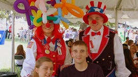 A couple of clowns bringing joy to children