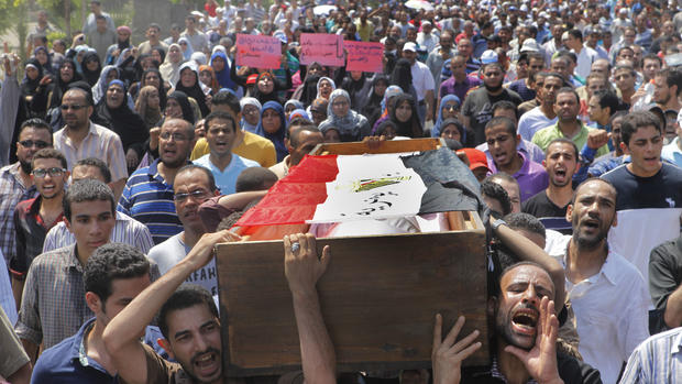 Egypt forces launch bloody siege to clear Morsi backers 