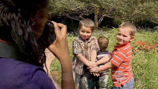 Victoria Turner, 16, takes a picture of two homeless boys in Summerville, S.C.