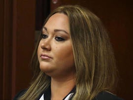 Zimmerman smashed iPad with video of spat, wife says