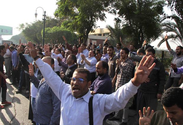 Supporters of the ousted Egyptian president Mohammed Morsi gather outside the High Court