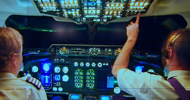 Are pilots too dependent on automated systems? CBS News