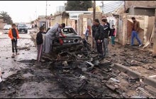 Iraqis, praying for peace, are once again bracing for war