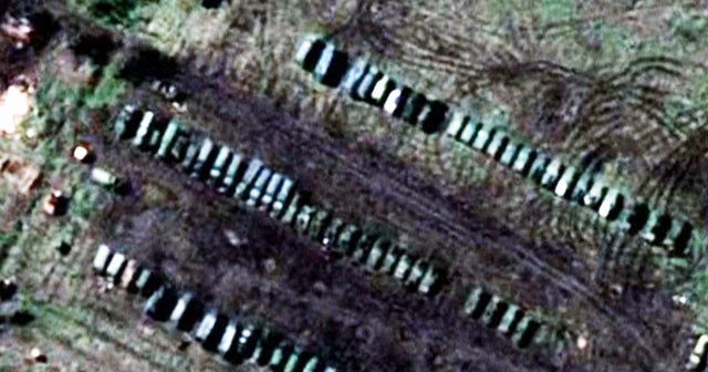 Satellite photos show Russian troops digging in near