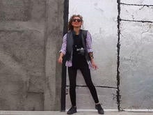 A young woman dances to Pharrell Williams' hit song "Happy" in a video posted online