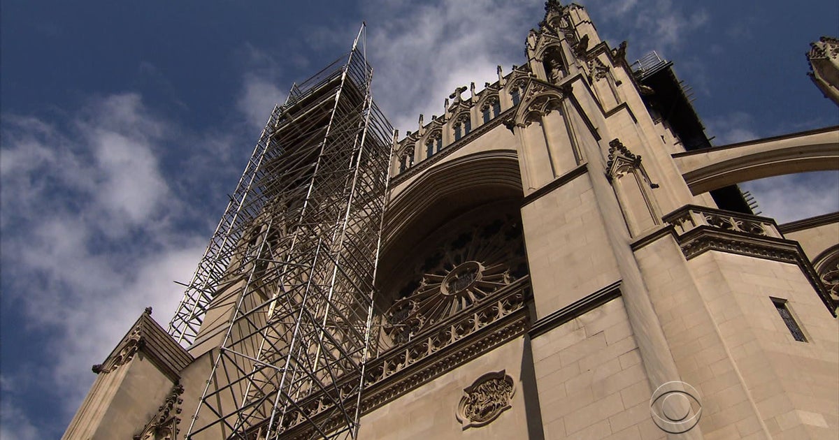 Stone masons work slowly, but proudly on National 