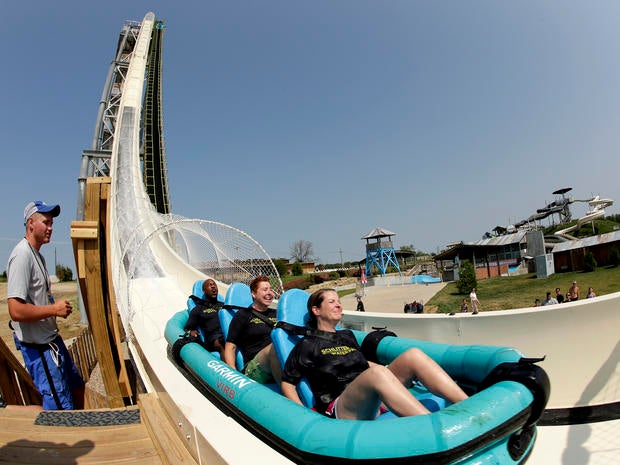 Riders go down the world's tallest waterslide, called "Verruckt," at Schlitterbahn Waterpark July 9, 2014, in Kansas City, Kan., in this picture taken with a fisheye lens.