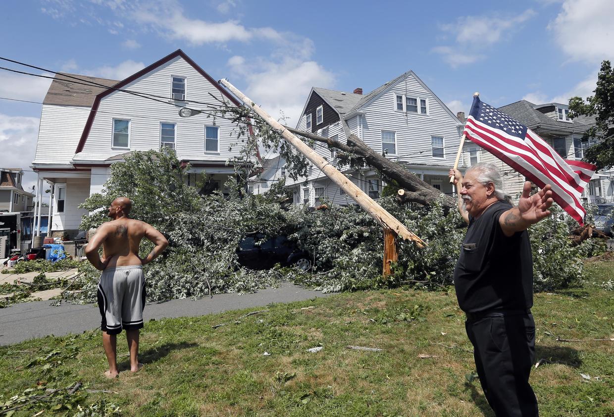 Tornado slams Boston area as eastern U.S. cleans up after powerful