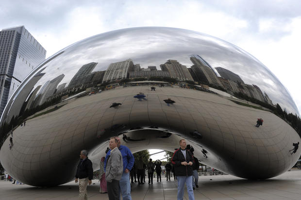 Chicago's skyline is reflected in the "C bean 