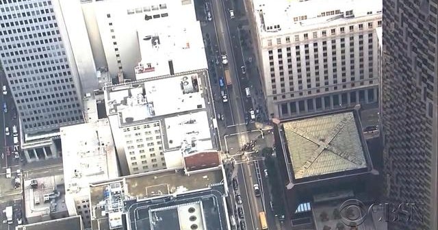 Man survives fall from building onto car in S.F. CBS News