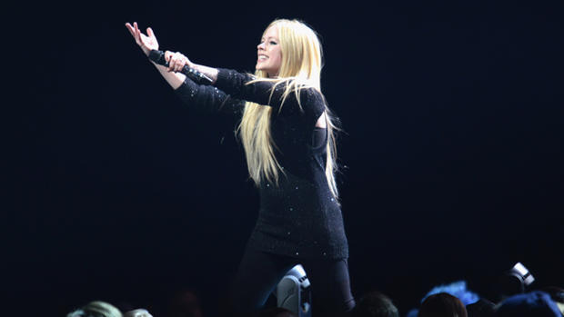 Avril Lavigne performs onstage during 103.5 KISS FMÂ's Jingle Ball 2013, presented by Jam Audio Collection, at United Center on December 9, 2013 in Chicago, IL. (Photo by Daniel Boczarski/Getty Images) 