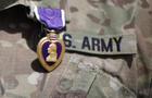 A Purple Heart medal is shown on a U.S. Army uniform during a ceremony June 6, 2011, at Combat Outpost Andar in Ghazni Province, Afghanistan. 