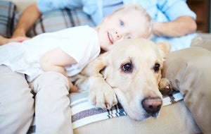 dog-with-child-on-couch.jpg