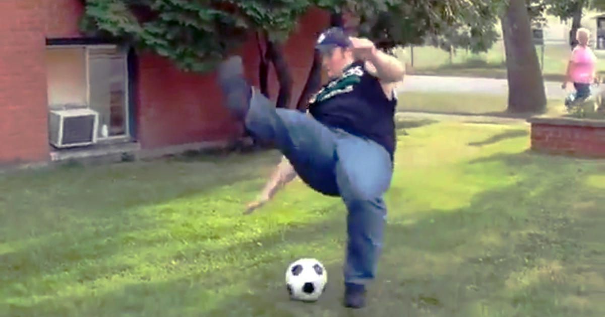 Man Gloriously Fails Attempt To Kick Soccer Ball On The Feed Cbs News 