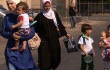 Family flees Syria for third time