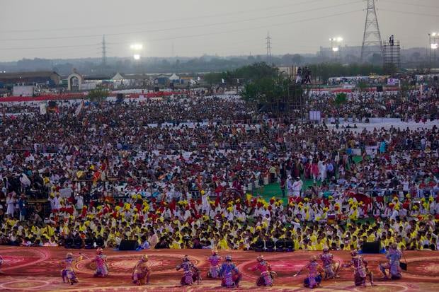 Thousands of followers of Indian guru Sri Sri Ravishankar gather for a performance at a three-day festival in New Delhi, India, organized by the guru's "Art of Life" foundation