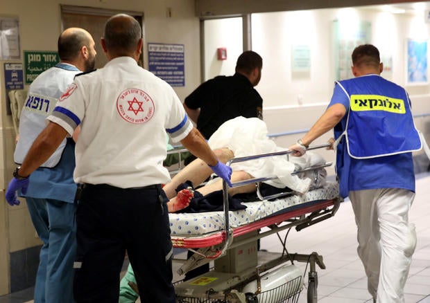 Injured person is taken into emergency room following shooting attack in center of Tel Aviv on June 8, 2016