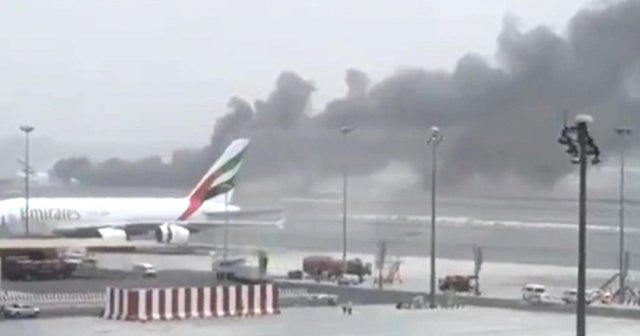 Emirates plane catches fire after crashlanding CBS News